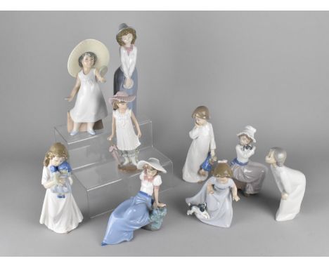 A Collection of Eight Various Nao Figures Together with a Lladro Example 