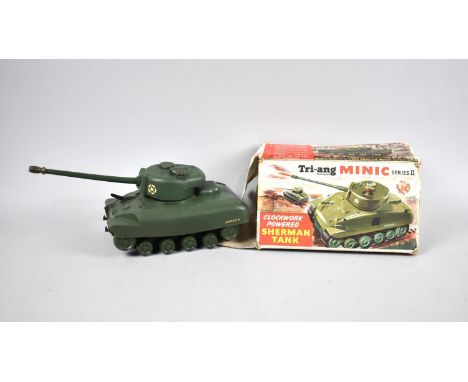 A Triang Minic Series II Clockwork Powered Sherman Tank in Box, a Self Steering Electric Car, Vintage Schuco 3000 Clockwork C
