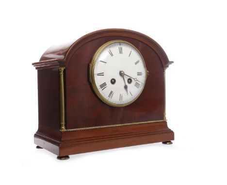 EDWARDIAN MAHOGANY MANTEL CLOCKthe movement by Japy Freres et Cie. numbered 6203, the white enamel dial with Roman numerals, 