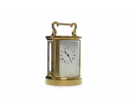 20TH CENTURY BRASS CARRIAGE CLOCKby ACG, the white enamel face with Roman numerals, of circular form, within a brass and beve