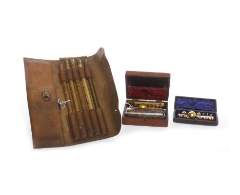 SIKE'S BRASS HYDROMETERno. 2635, with a mercury thermometer, in a fitted mahogany case; along with a further Sike's hydromete