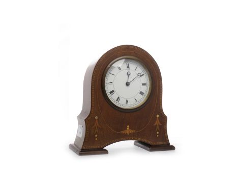EDWARDIAN MAHOGANY MANTEL CLOCKthe Swiss movement numbered 53692, the white enamel dial with Roman numerals, contained in an 