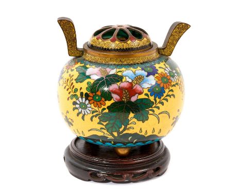 Japanese cloissoné enamel Koro and pierced cover, decorated with foliage on yellow ground, raised on wooden stand, total heig