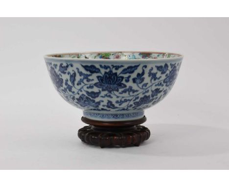 Unusual 19th century Chinese porcelain bowl, the outside decorated in underglaze blue with lotus flowers in the Ming style, t