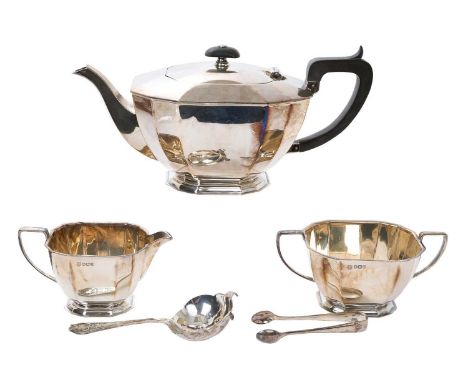 Contemporary silver three piece tea set, comprising teapot of faceted form, with flush fitting hinged cover, and angular comp