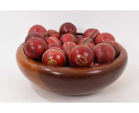 Wooden bowl housing 35 vintage cricket ball