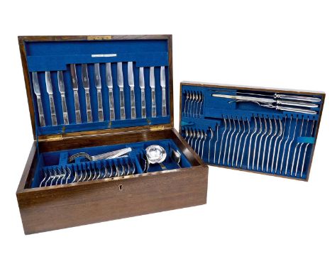 Mid 20th century canteen of Nile pattern silver plated cutlery, in an oak case, with key, by Walker &amp; Hall, comprising si