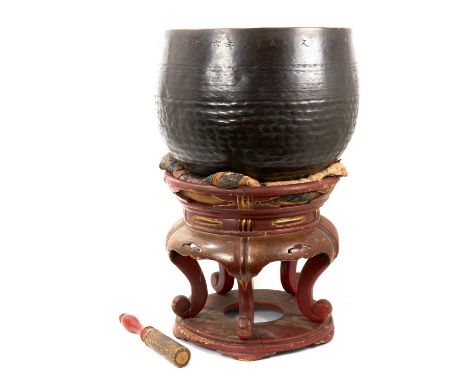 Japanese bronze temple gong or singing bell, on stand, 19th century or earlier, the bowl of typical hemispherical form approx