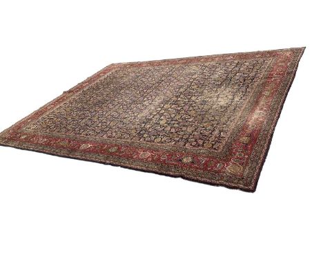 Good early Persian Bijar carpet, with allover floral knotwork on midnight blue ground, 400 x 300cmSignificant wear, small los