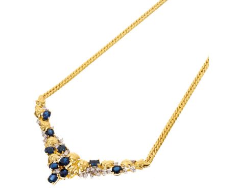 Sapphire and diamond necklace with oval mixed cut blue sapphires and brilliant cut diamonds in floral and foliage design, in 