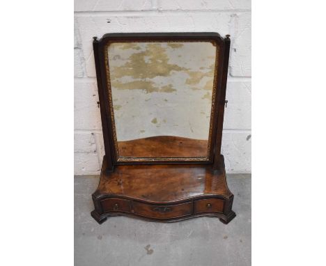 George II Chippendale mahogany toilet mirror, the swing plate with re-entrant angles, the platform base with three drawers fl