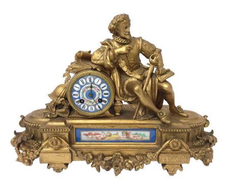Late 19th century French gilt metal mantel clock with Tudor figure mount and painted porcelain dial and panel decorated with 