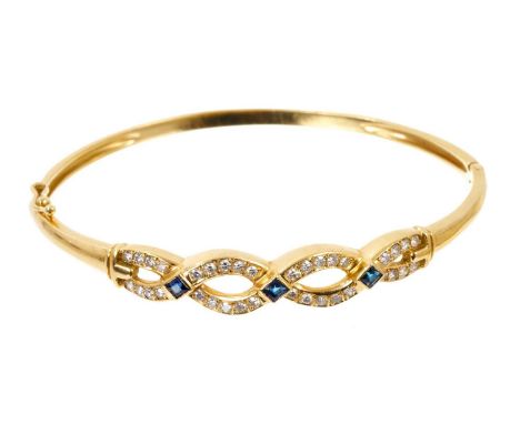 Sapphire and diamond hinged bangle with a platted design of single cut diamonds and three blue sapphires in 18ct gold setting