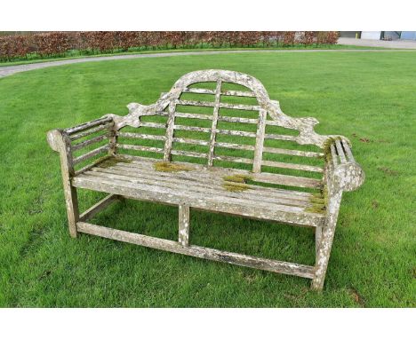 Lutyens style teak garden bench, approximately 166cm wideOne seat rail is partially missing, minor splits and general weather