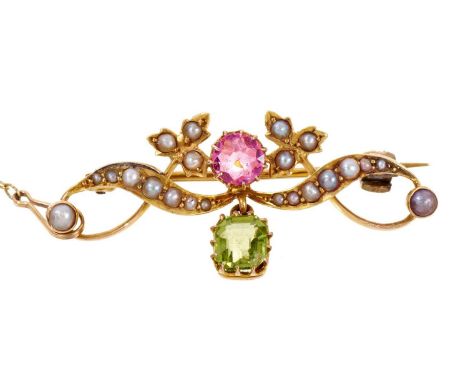 Edwardian pink tourmaline, peridot and seed pearl brooch, the octagonal step cut green tourmaline suspended from a round mixe