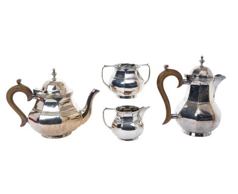 Early 20th century silver four piece tea set, comprising teapot of octagonal baluster form, in the George I style, with hinge