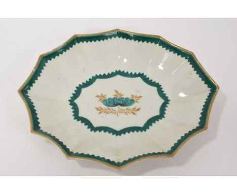 18th century Worcester porcelain fan shaped dish, with green enamel and gilt decoration, 30.5cm wideSome gilt wear. Chip to t