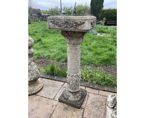 Brass sundial on a concrete pedestal base with weathered finish, 80cm high.