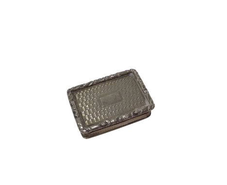 Victorian silver vinaigrette of rectangular form, with engine turned decoration and hinged cover, opening to reveal a silver 