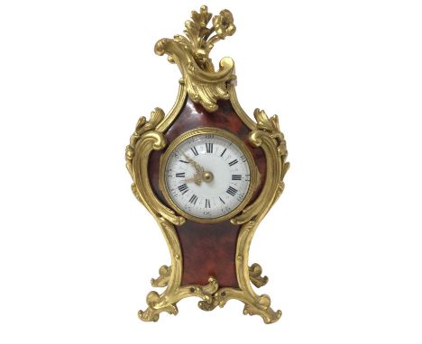 Late 19th century French rococo red tortoiseshell and ormolu mantel clock with enamelled dial, cylinder movement by Paris mak