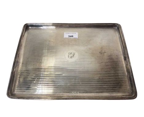 George V silver dressing table tray of rectangular form, with raised border, engine turned decoration and engraved initials (