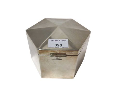 1920s silver tea caddy of plain hexagonal form, with hinged opening cover (marks rubbed Sheffield 1926 or 1928) James Dixon &