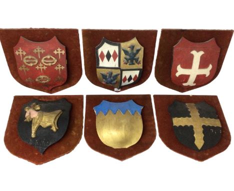 Group of six decorative carved wooden, gesso and polychrome armorial shields, almost certainly film or theatre props acquired