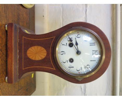 A mahogany and patera inlaid waisted mantel clock, with enamel dial, brass pad feet and twin train HAC movement, 28.5cm high