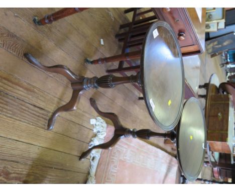 Two reproduction mahogany tripod tables, with reeded baluster supports, 38cm diameter