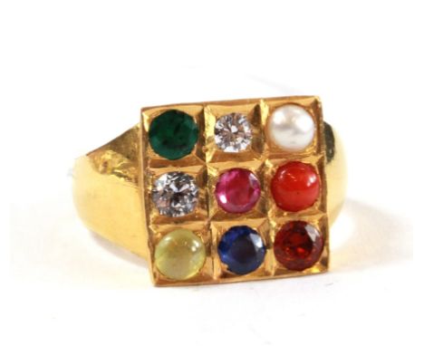 A gem set diamond ruby sapphire emerald ring in square form