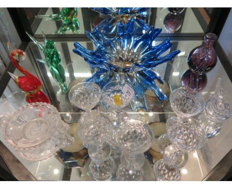 A blue glass splash form bowl, a Caithness glass vase, three glass bird ornaments, a pressed glass dish and six sherry glasse