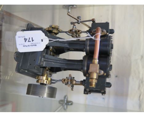 A Stuart Turner D10 vertical twin cylinder live steam engine, fitted with reversing gear 14cm high