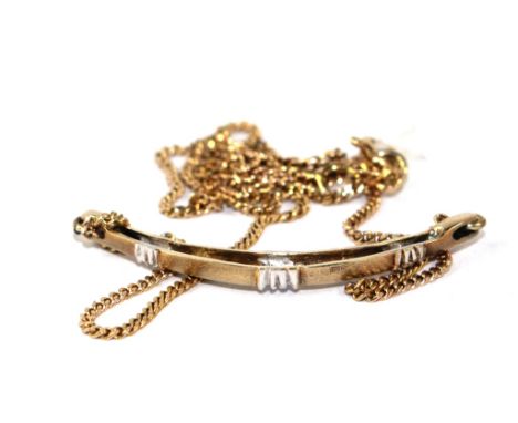 A diamond set pendant and chain