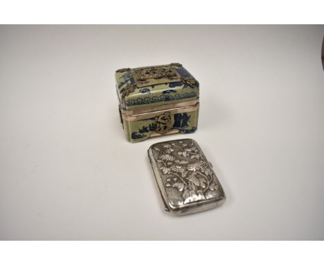 A Chinese silver cigarette case by Yung Lei Shanghai 1880-1915 with images of chrysanthemums and dragons 8.8cm x 5.7cm, 86.2g