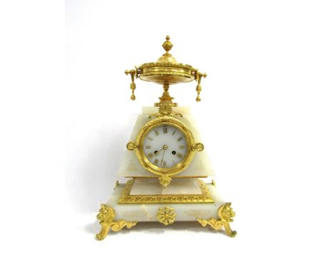 A large French onyx and gilt metal mantel clock of Egyptian design, scroll and cat form feet, engraved gilt hieroglyphs to on