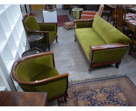 A late 19th Century/early 20th Century empire style sofa and two tub chairs (3) the sofa is 180cm long