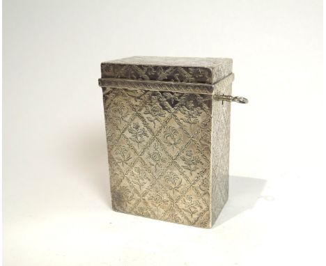 A George II Edward Wakelin silver lockable tea caddy of rectangular form with all-over lozenge pattern decorated with roses a