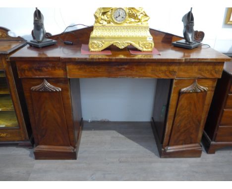 A Victorian mahogany breakfront sideboard of Architectural forum with three drawers to top and two cupboard pedestal supports