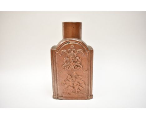 A Victorian Nottingham salt glazed stoneware bottle vase / tea caddy with high relief detailed front and back panel, decorate