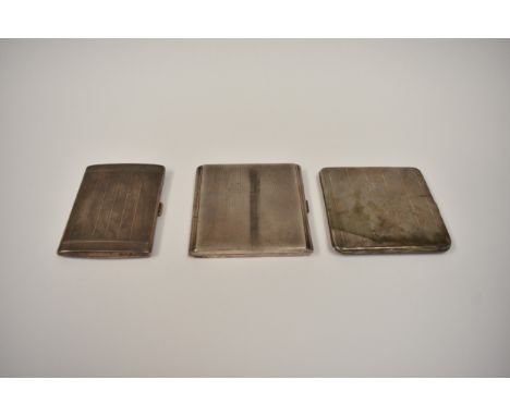 Two square form silver cigarette cases and a smaller example all with engine turned detail. All Birmingham. Two by William Ne