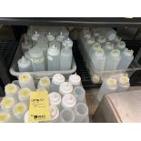 Lot de réceptacles à sauces plastiques dans 5 bacs +