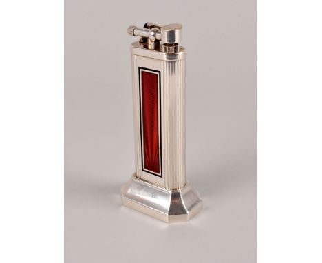 A fine Dunhill silver and enamelled table lighter, on octagonal weighted base, no. 23397, having red guilloche panel within b