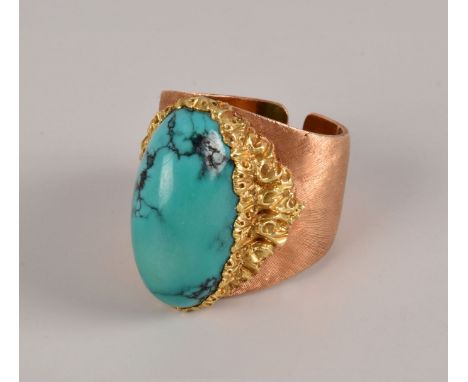 A 1960s 18ct gold and turquoise dress ring by Buccellati, having thick textured tapered band with cut to reverse, with ornate