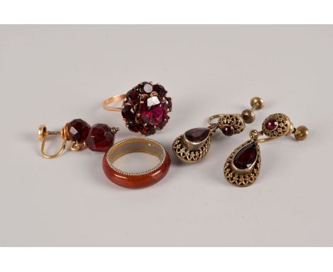 A continental gold and garnet cluster dress ring, chipped to central stone, together with a pair of garnet drop pendant earri