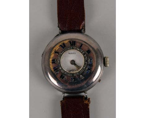A WWI period silver Rolex half hunter trench style wristwatch, c.1916, blue enamel Roman numerals to demi-cover, enamel rubbe