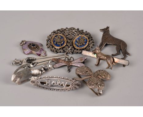 A small collection of silver and other jewellery, including an Alsatian brooch, a marcasite and enamel brooch and other items