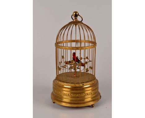 A Karl Griesbaum (German, 1872-1941), automaton singing bird in cage in the style of the earlier Blaise Bontems models, marke