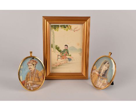 A pair of fine late 19th century Indian portrait miniatures, each one a well painted oval ivory panel, one with a noble gentl