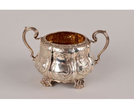 A William IV silver sucrier by Joseph Angell I and John Angell I, London 1835, of melon form decorated with chased floral car