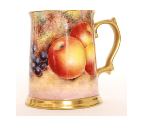 A later 20th Century tankard decorated by former Royal Worcester artist G. Delaney in the Fallen Fruits style with apples and